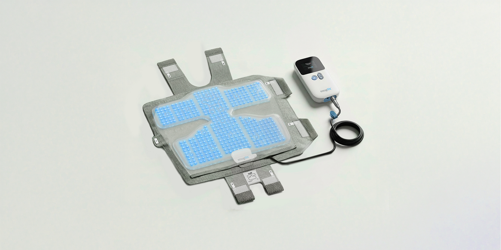 A look at the Snuglit phototherapy wearable device for infant, attached to its controller